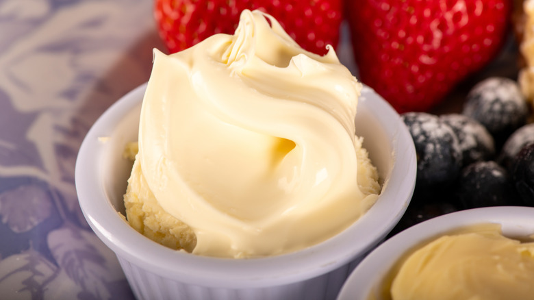 Small white bowl of whipped clotted cream
