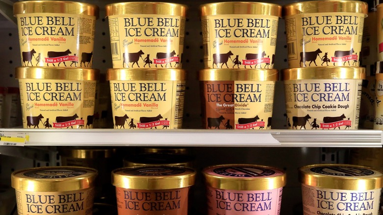 Half gallons of Blue Bell Ice Cream flavors in the freezer section