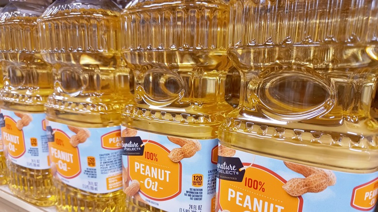 Plastic bottles of peanut oil.