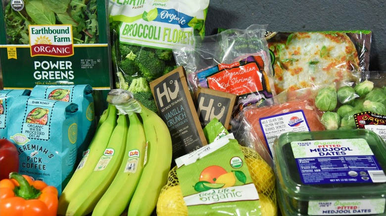 A variety of groceries grouped together by category.