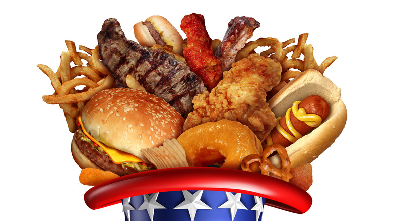 A bunch of food coming out of an Uncle Sam hat