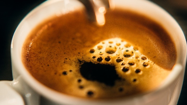 Close up of espresso in a white mug