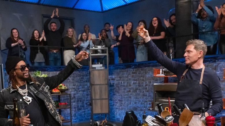 Lil Jon and Bobby Flay toasting on "Beat Bobby Flay"