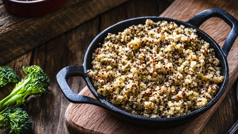 Cooked quinoa in a cast iron pan.