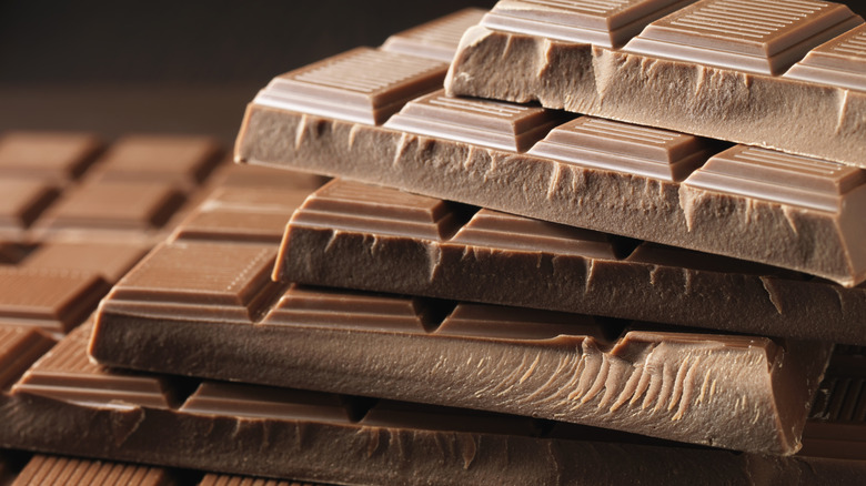 Chocolate bars stacked on top of one another
