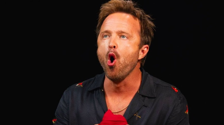 Aaron Paul having a reaction on Hot Ones