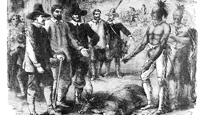 An old illustration of the Pilgrims and Native Americans