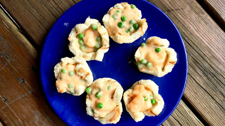 Shrimp wiggle on blue plate, overhead view