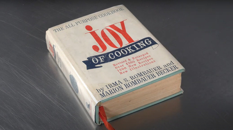 A copy of "Joy of Cooking" on a metal surface
