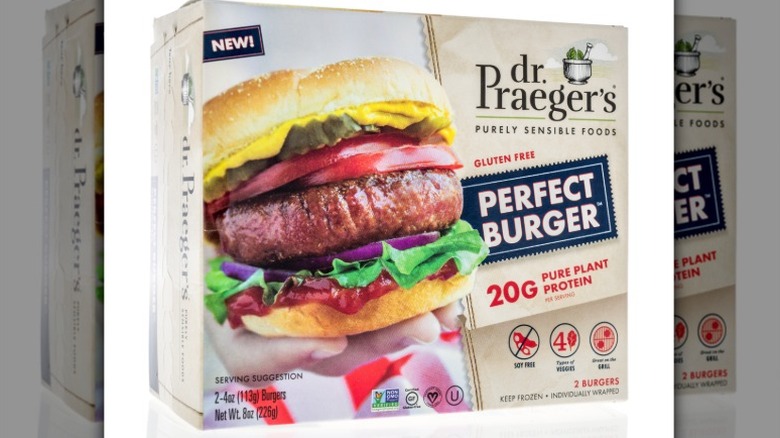 A package of Dr. Praeger's plant-based Perfect Burger patties isolated on a white background