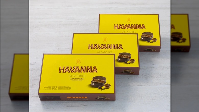 Three boxes of Havanna Alfajores with yellow and brown coloring