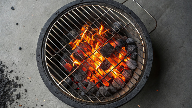 Charcoal briquettes in a grill