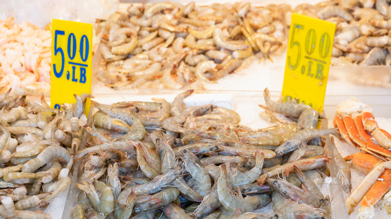 Fresh shrimp on ice at a fish market
