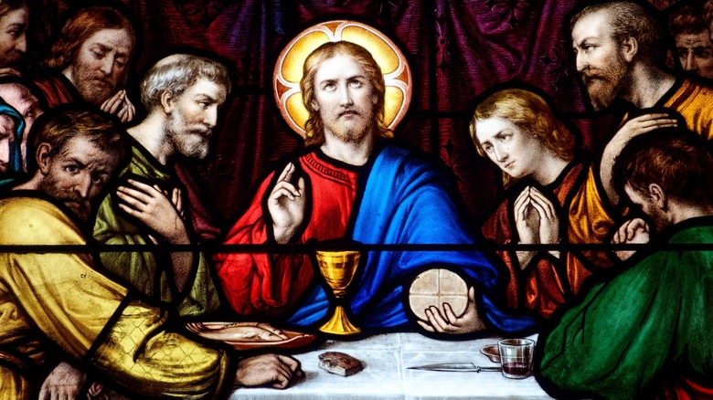 Detail of a stained glass window portraying the Last Supper.