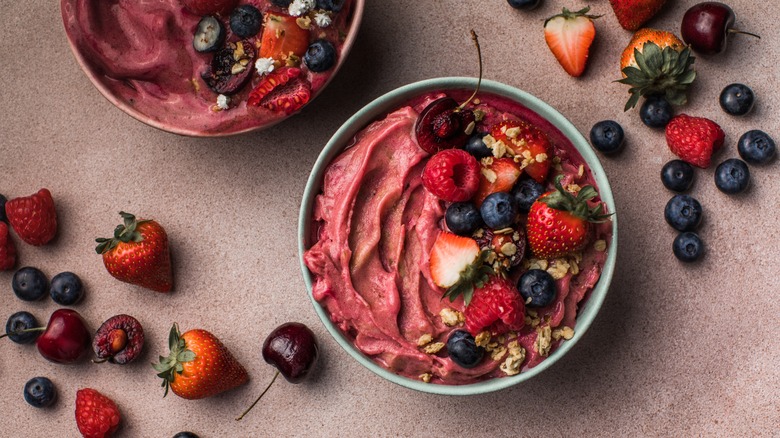 A smoothie bowl with berries and oats.