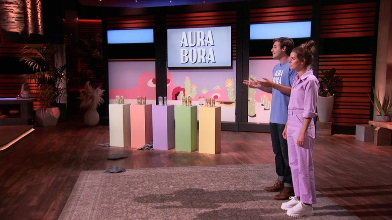 The Aura Bora founders appear on the Shark Tank set