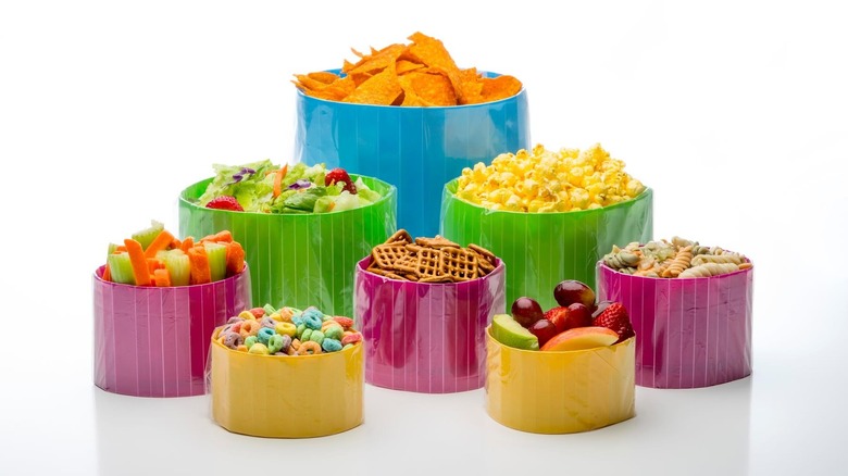 Different food items presented in various BagBowls on top of a white surface.