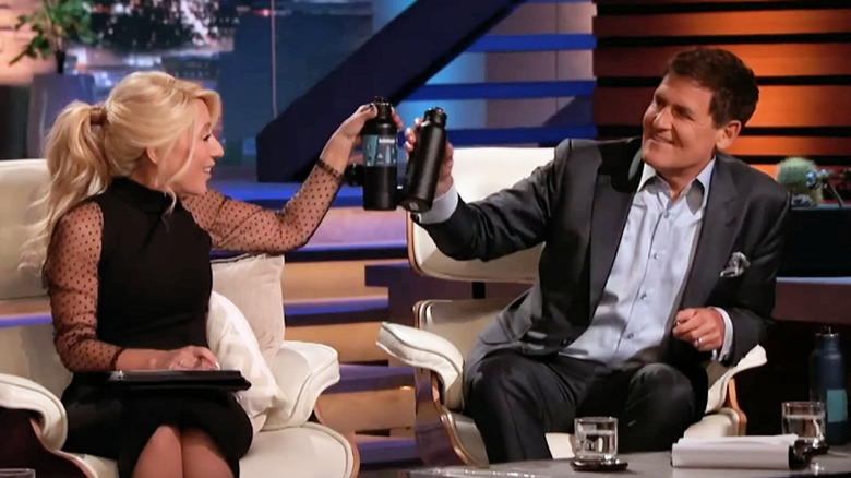 Mark Cuban and Lori Greiner celebrating with BottleKeepers after securing a deal on "Shark Tank."
