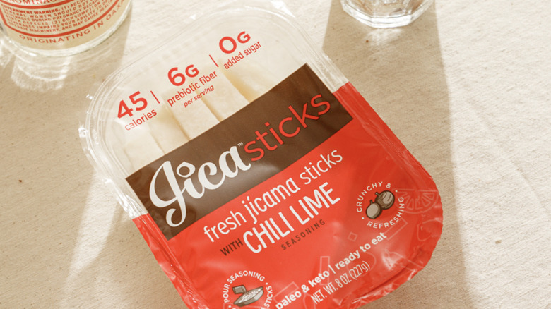 Jicasticks, one of JicaFoods' products, placed on a table covered in white cloth.