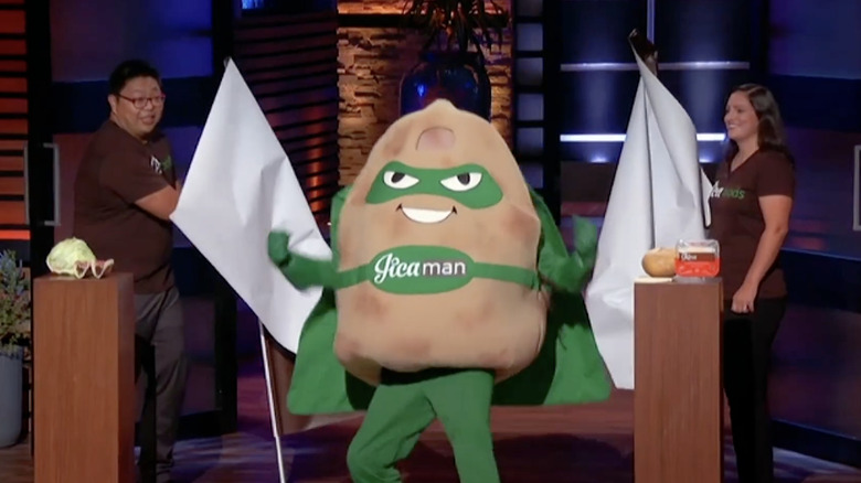 JicaFoods co-founders Xin Wang and Melissa Colella-Wang presenting the Jicaman mascot during their "Shark Tank" pitch.