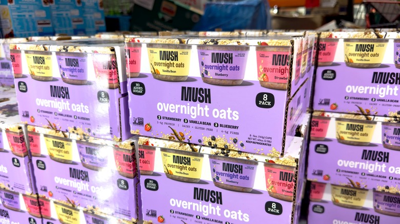A view of several cases of Mush Oats, on display at a grocery store.