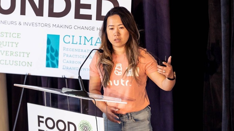 Alicia Long speaking about Nutr at an event