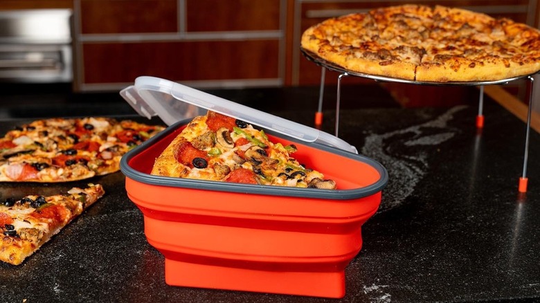 Hands holding Pizza Packs