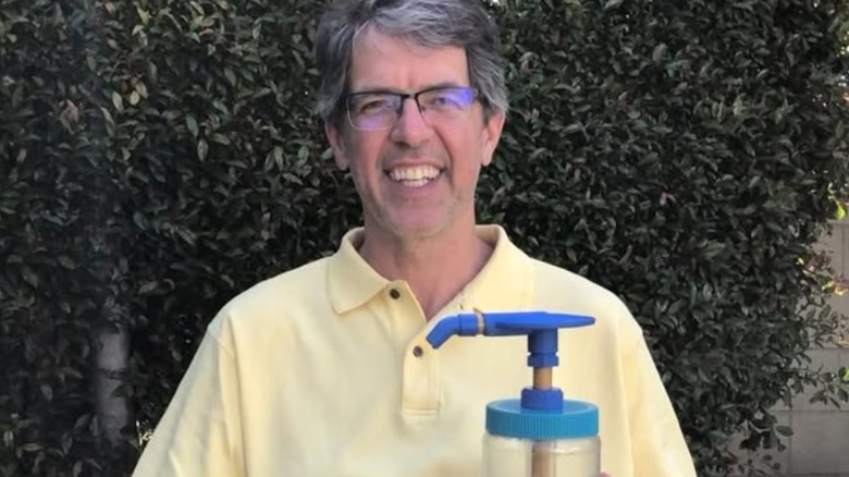 Andy Scherer holding the Peanut Butter Pump