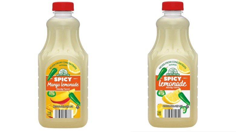 A bottle of Nature's Nectar spicy mango lemonade beside a bottle of Nature's Nectar regular spicy lemonade
