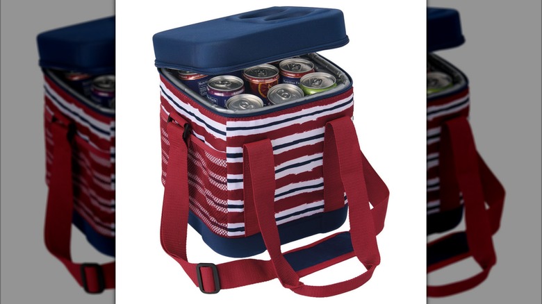 The striped red Live In Style Fliptop Cooler with drinks inside of it