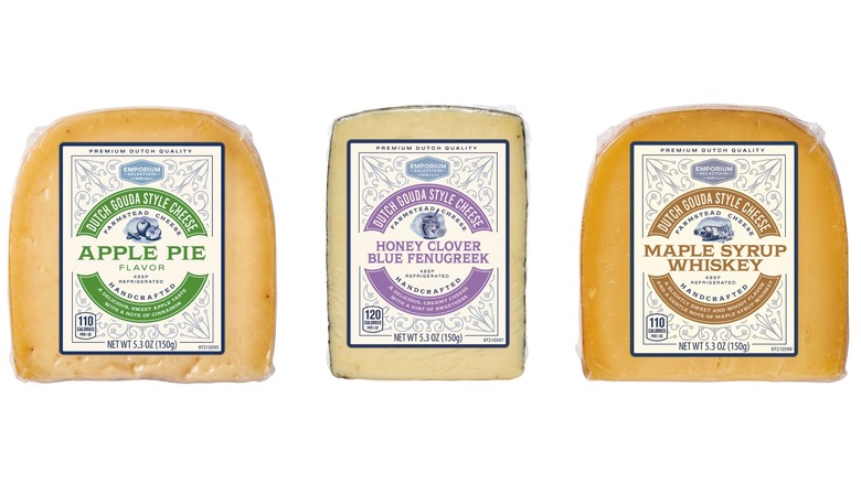 Emporium Selection Apple Pie, Honey Clover Blue Fenugreek, and Maple Syrup Whiskey Dutch gouda-style cheeses on white background