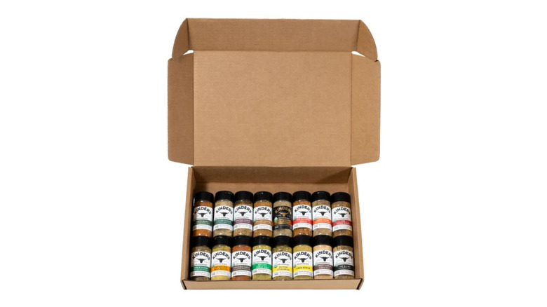 An open brown box of Kinder's seasoning on a white background.