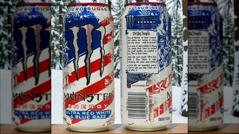 Front and backside of a special edition Monster can with an American flag decal in front of a snowy background.