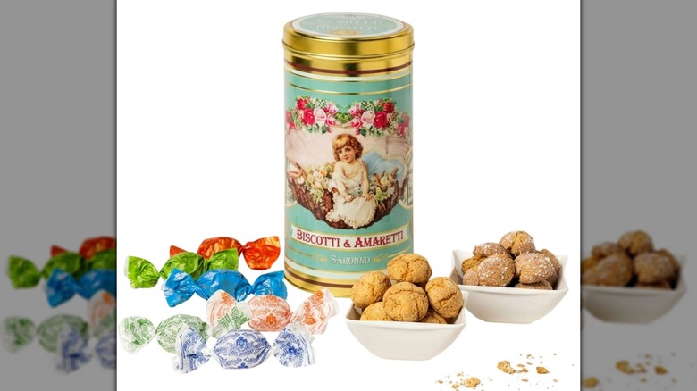 Chiostro Biscotti and Amaretti Tin with cookies in white dishes on white background