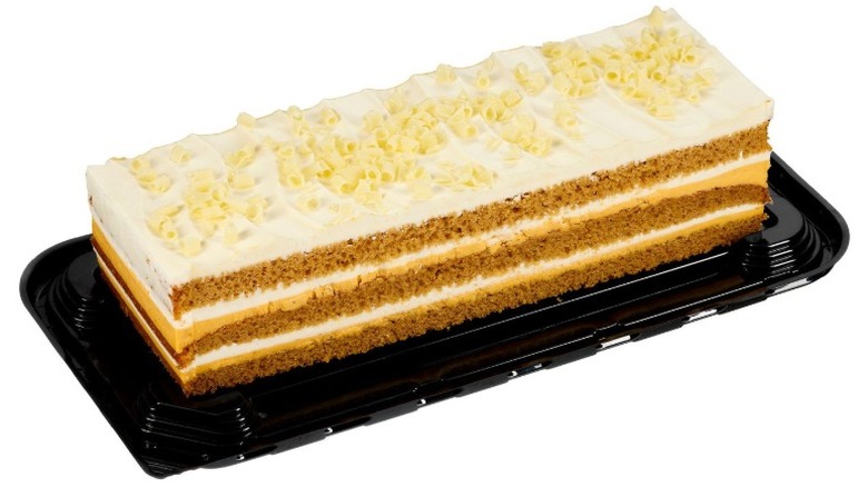 Kirkland Signature Pumpkin Bar Cake on a black plastic tray on a white background.