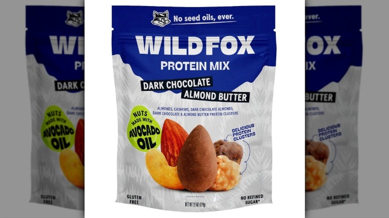 Wild Fox Dark Chocolate Almond Butter Protein Mix in a foil pouch on a white background.