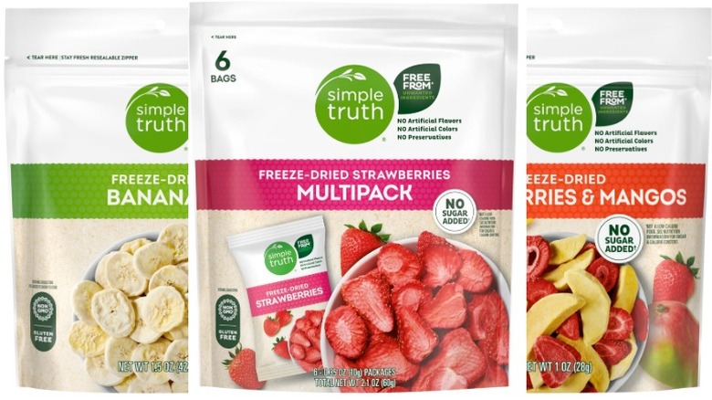 Pouches of Simple Truth Freeze Dried Strawberries and Mangos, Simple Truth Freeze Dried Bananas, and Simple Truth Freeze-Dried Strawberries on a white background.