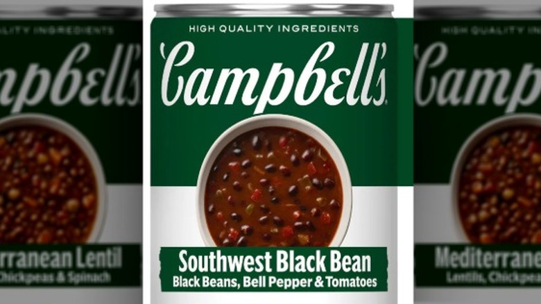 Cans of Campbell's Mediterranean Lentil soup and Campbell's Southwest Black Bean soup on a white background.
