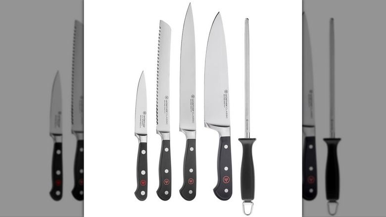 Five knives on a white background from Wusthof Classic 5-Piece Chef's Knife Set.