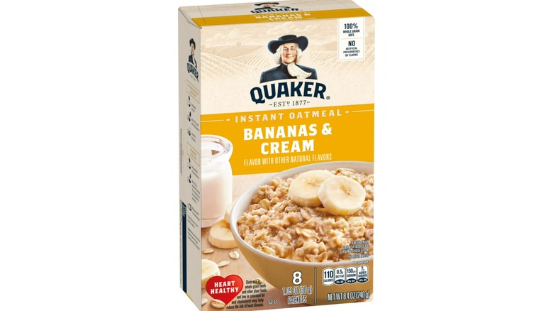 Product image of Quaker instant oatmeal bananas and cream on a white background.