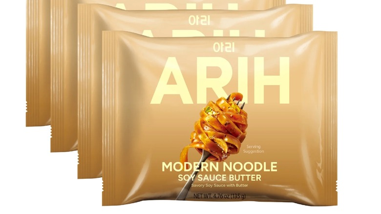 Four packs of Arih Soy Sauce Butter Modern Noodles on white background