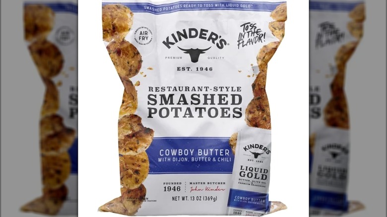 Bag of Kinder's Cowboy Butter Frozen Smashed Potatoes on white background