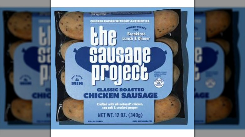 A blue packaging of The Sausage Project classic roasted chicken sausages