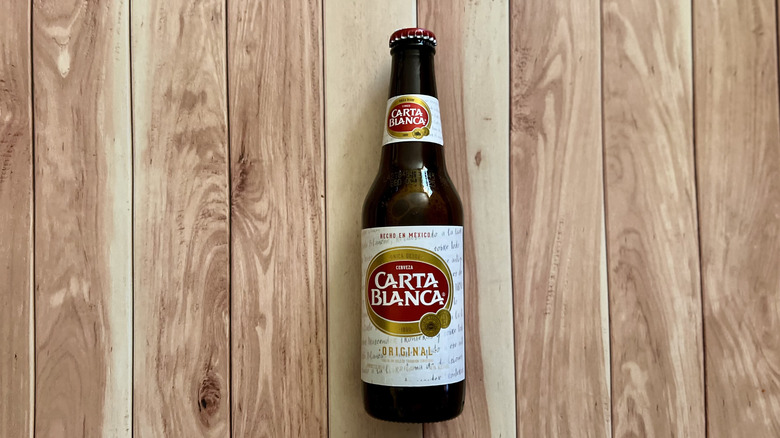 a bottle of Carta Blanca