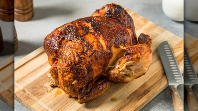 homemade rotisserie chicken on cutting board