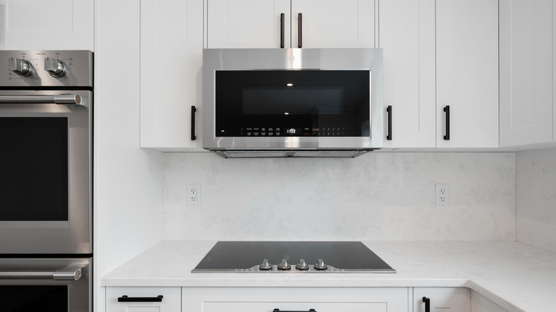 A microwave over a kitchen range