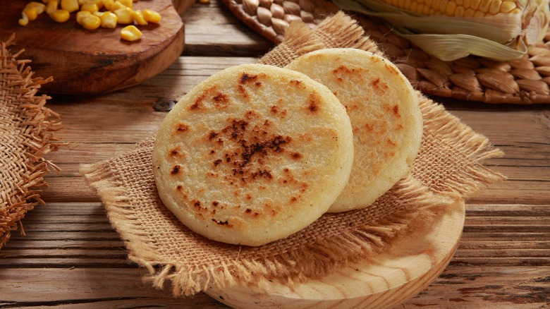 Two Colombian arepas on a dish