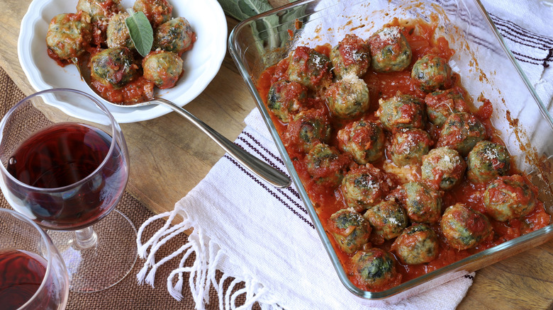 Gnudi in red sauce with sage leaf and red wine