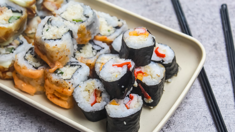 Assorted sushi rolls on a plate