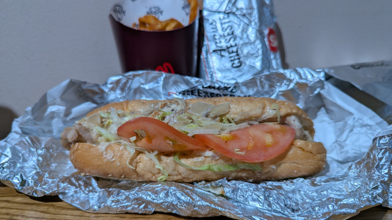 Arby's Chicken Deluxe Cheesesteak resting in foil